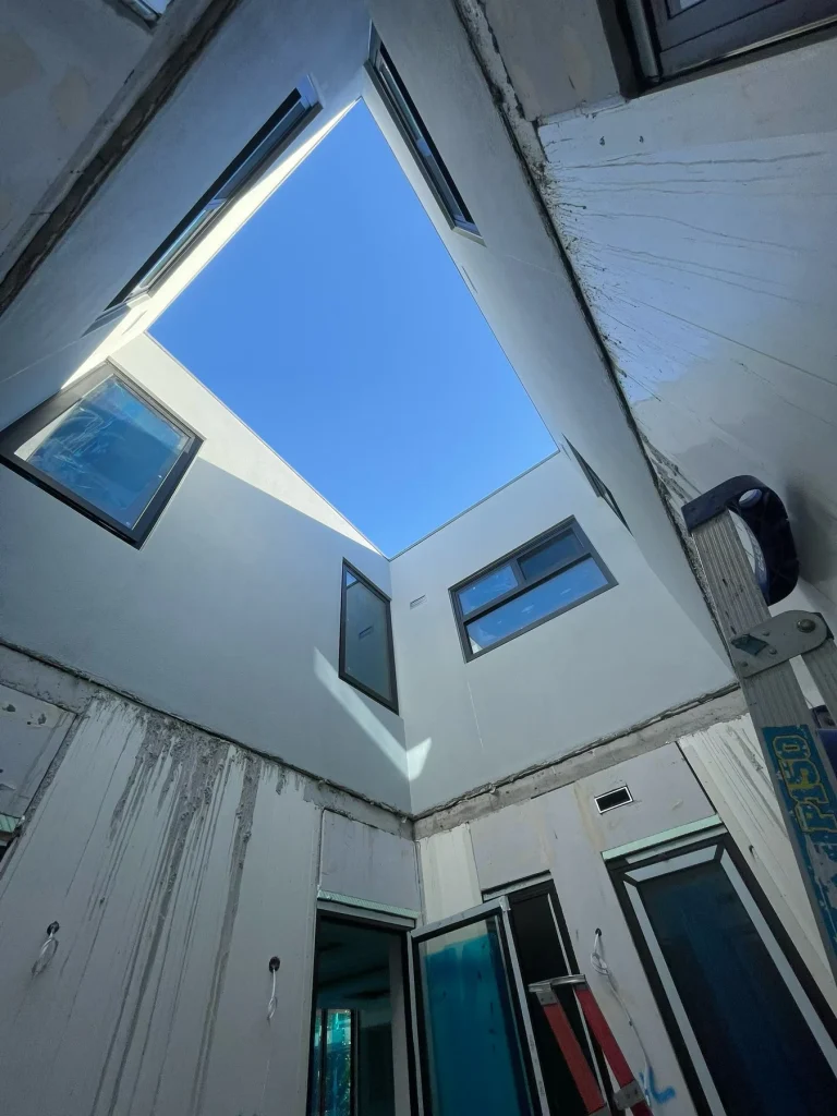 Interior view of high-level windows and overhead glazing